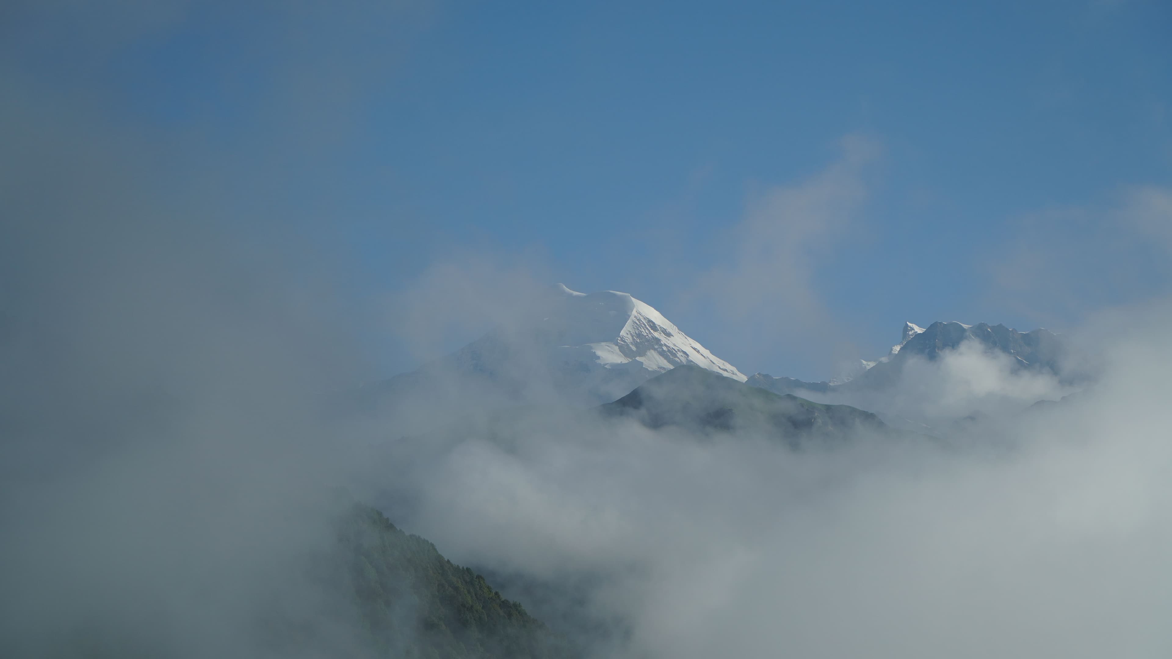Trekkers ascending the ridge